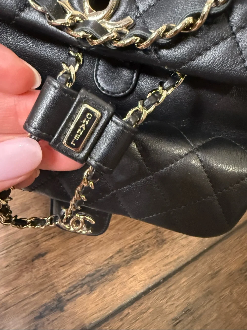 Black Quilted Leather Backpack in with Gold hardware